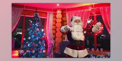 Funny Santa with Christmas lights dancing in the house. (Videohive 46140417)